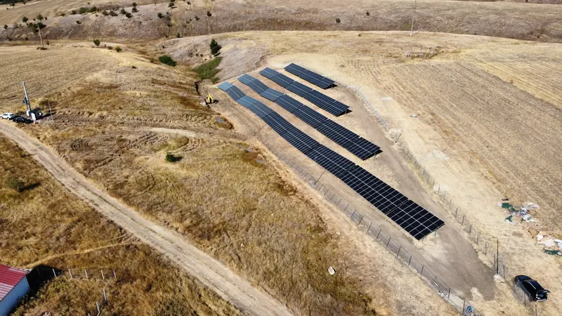 The solar park in the valley, with site equipment